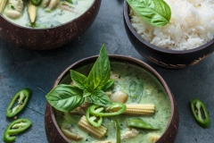 Green curry with chicken in a bowl, thai cuisine